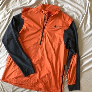 Nike orange and grey golf pull over